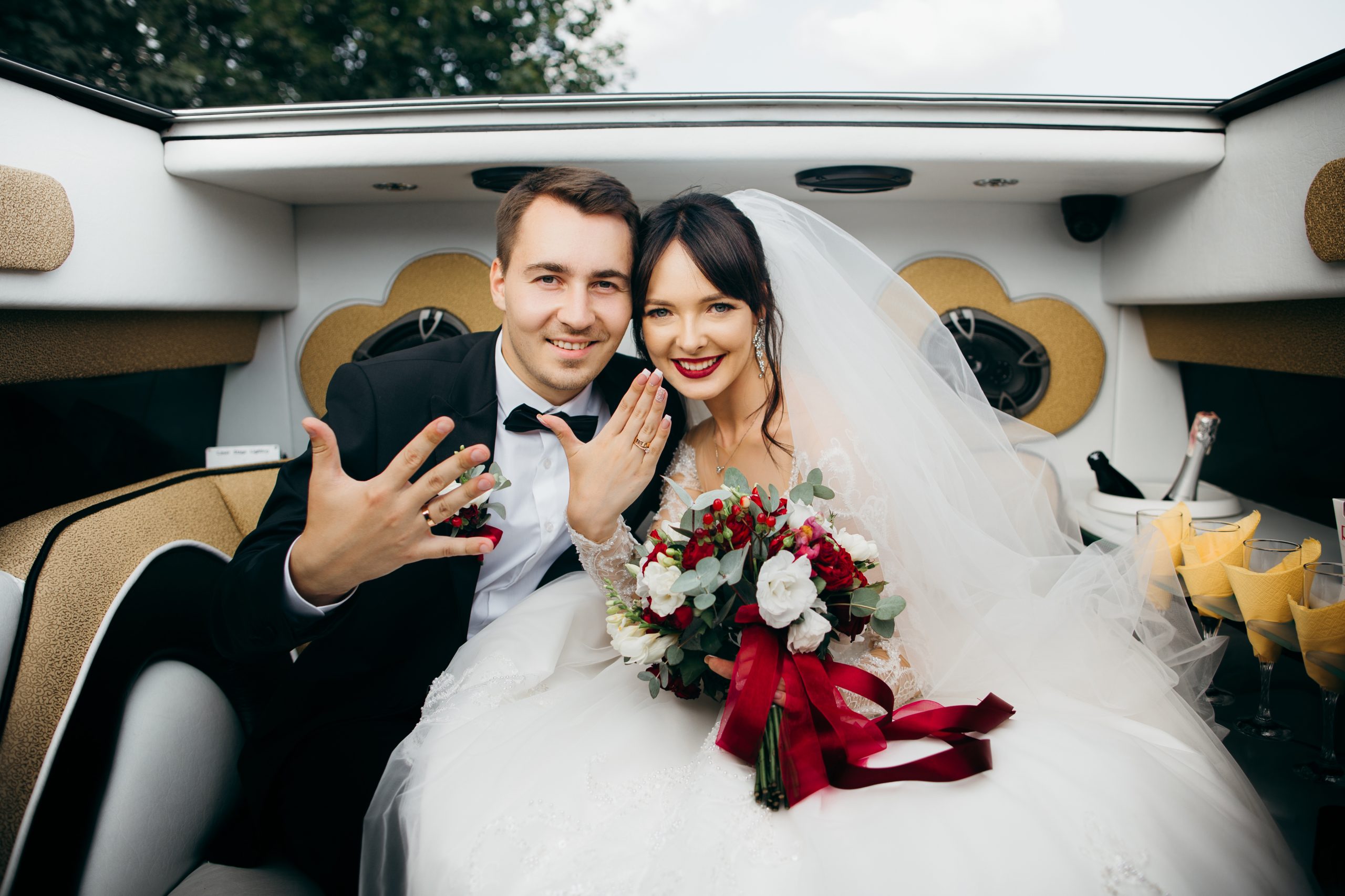 Happy newlywed in limo